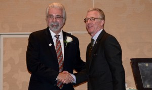 REALTOR® Michael Rickert is honored for work with seniors. 