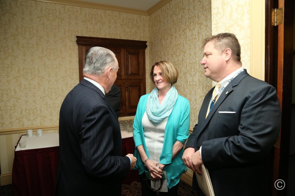 Sen. Christine Radogno talks with Illinois REALTORS Immediate Past President Jim Kinney (left).