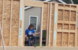 Mabél Guzmán works on a Habitat for Humanity project in Springfield in 2014. Guzmàn has been a volunteer leader with the association for many years, and had participated in numerous Habitat builds.