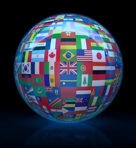 Globalize the world. More than 200 flags of all the world united around of the globe. Concept of peace and union among the people of the world.