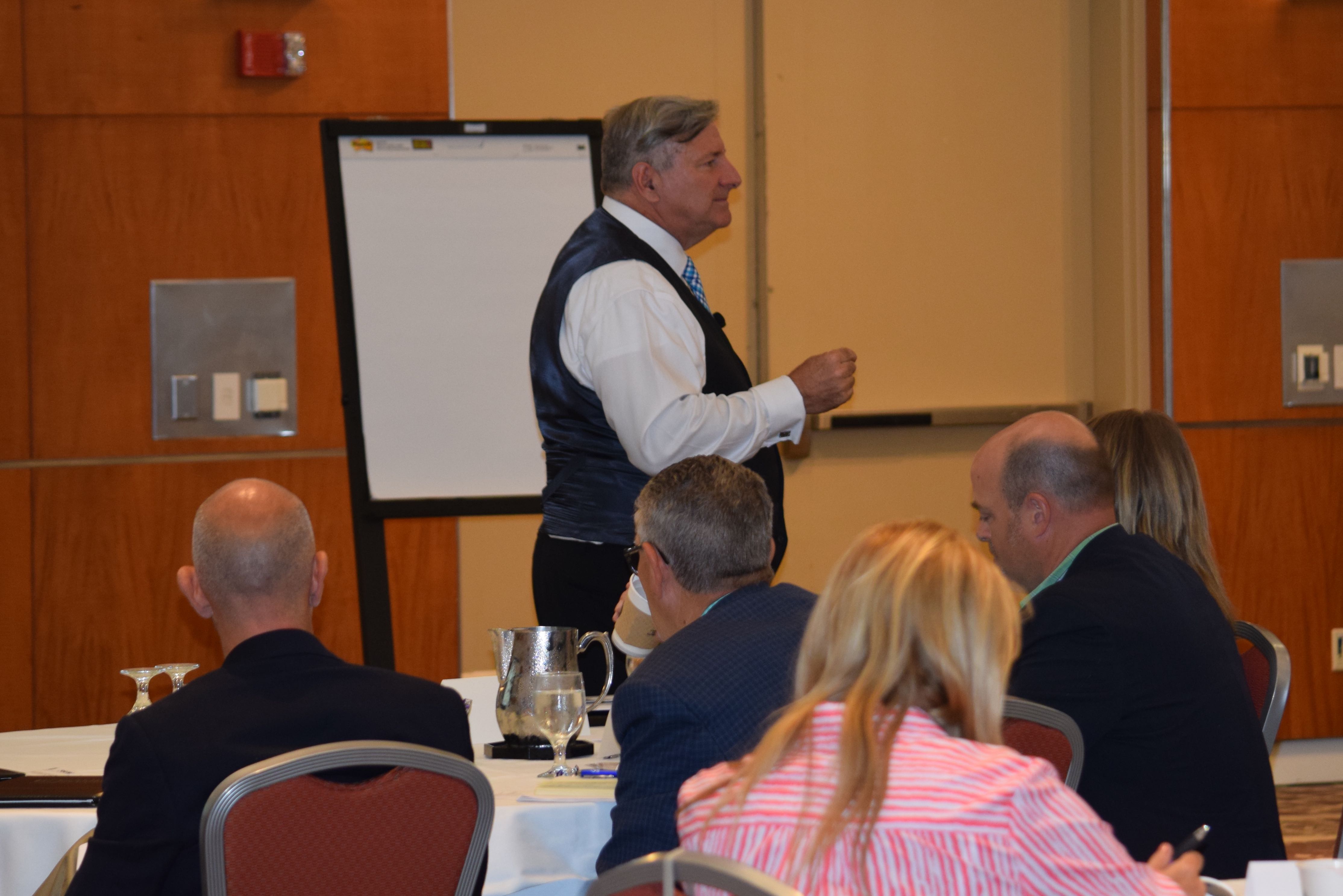 2011 NAR President Ron Phipps talks to association executives and incoming local board presidents at the annual Illinois REALTORS® Leadership Forum held in Chicago on Sunday. Aug. 21, 2016. 