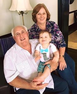 Jerry Downs with wife Kathy and grandson Fordyce.