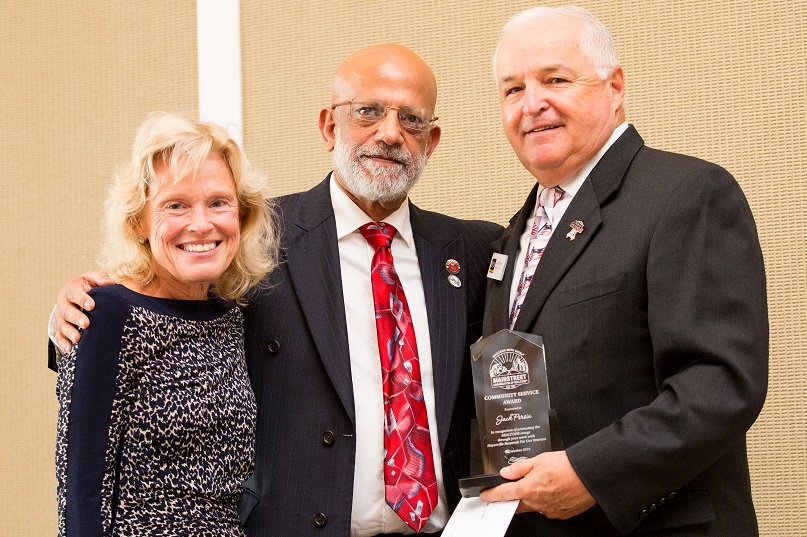 Jack Persin (right) received the Mainstreet Community Service Award last week. He's joined in the photo by his wife Diane and Ahmed Badat. 