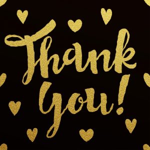 Thank you - gold glittering lettering design on black background with hearts pattern