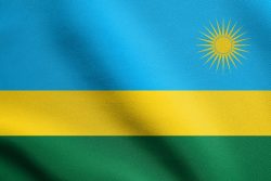 Rwandan national official flag. African patriotic symbol banner element background. Flag of Rwanda waving in the wind with detailed fabric texture, illustration