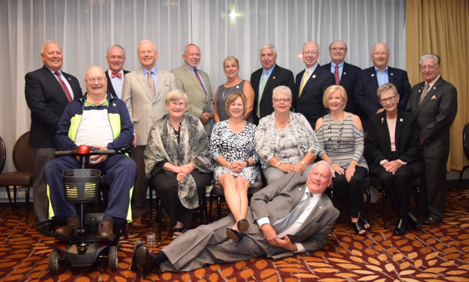 Past presidents of Illinois REALTORS® gather for a dinner held on Wednesday, Oct. 5, 2016, to induct 2016 President Mike Drews into their ranks. Drews, foreground, served during the association's 100th anniversary.