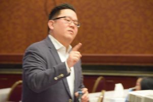Nobu Hata, NAR's director of digital engagement, speaks at GRI Grad in East Peoria. 