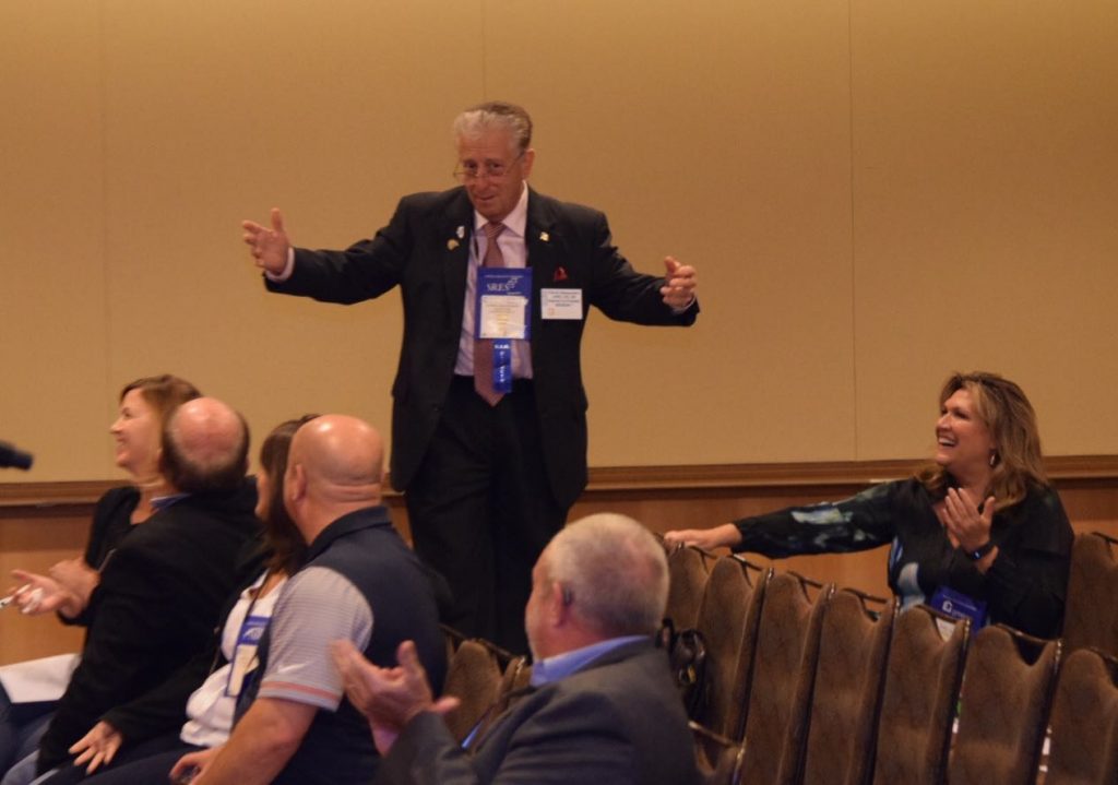 Illinois REALTOR® Pat Dalessandro makes a statement at the Illinois Caucus. The session allows REALTORS® attending the REALTOR® Conference & Expo in Orlando.