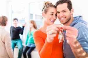 Family in new home with Realtor