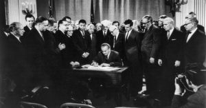 On April 11, 1968, President Lyndon B. Johnson signed the Civil Rights Act of 1968. Title VIII made it illegal to discriminate in renting or selling property based on race, color, religion, or national origin. Photo: Library of Congress
