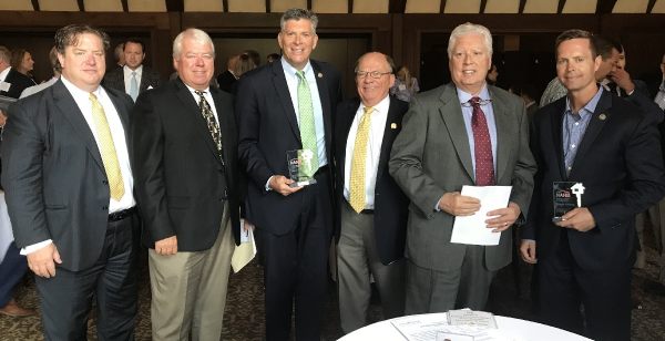 Photo shows, left to right: Neil Malone, Pat McCarthy, US Rep. Darrin LaHood (18th District), Ed Neaves, Max Mitchell, US Rep and Rodney Davis (13th District).
