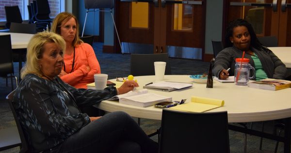 Photo of Carrie Elliott, Kristen Butcher and Aniya Lathan.