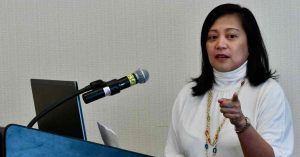 Atuel Hope, executive director of the Asian Real Estate Association of America speaks at an Illinois REALTORS® Global Business Council meeting.