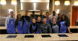 Group photo of 13 volunteers representing the Chicago Association of REALTORS Young Professionals Network.