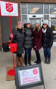 Photo of four REALTORS ringing bells for Salvation Army of Crystal Lake and McHenry County
