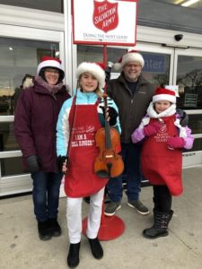 Photo of four volunteers for Salvation Armty of Crystal Lake and McHenry County