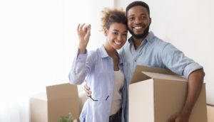Happy couple in their home