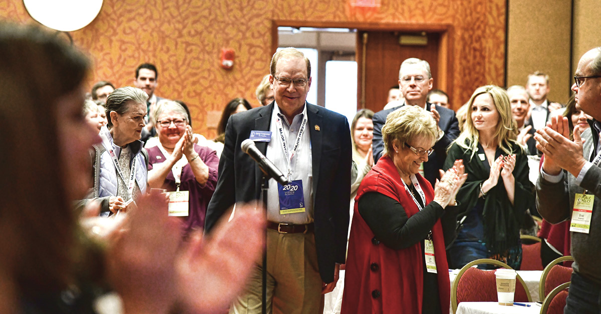 Doug Carpenter is congratulated by his colleagues after being announced 2020 Illinois REALTOR® of the Year during the association's Public Policy meetings.