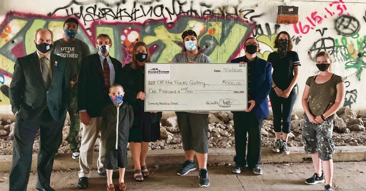 HomeTown Association of REALTORS® members secured a $1,500 NAR grant to assist with the clean-up of graffiti in an underpass in DeKalb.