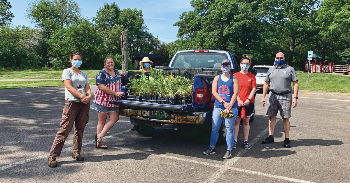 Members of Heartland REALTOR® Organization volunteered on the Pollinator Meadow Project, removing invasive species, building a boardwalk and pathway, and reintroducing native plantings to the area.